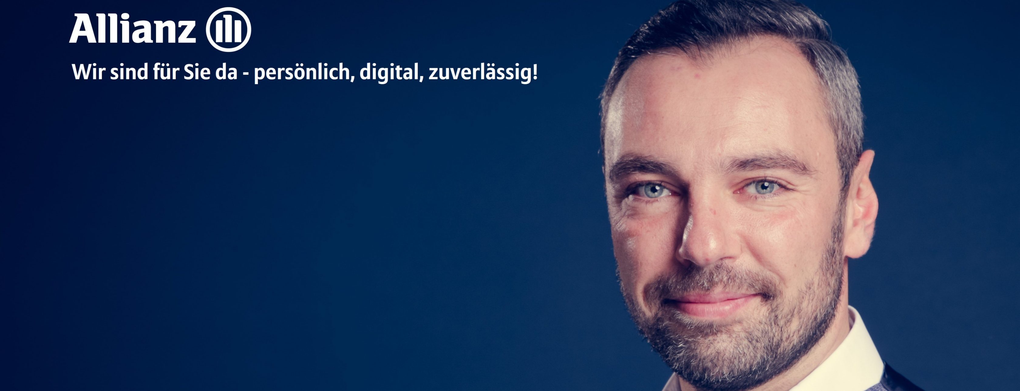 Allianz Versicherung Cengiz Kaymak Herne - Einzelfoto Kaymak mit Allianz Logo