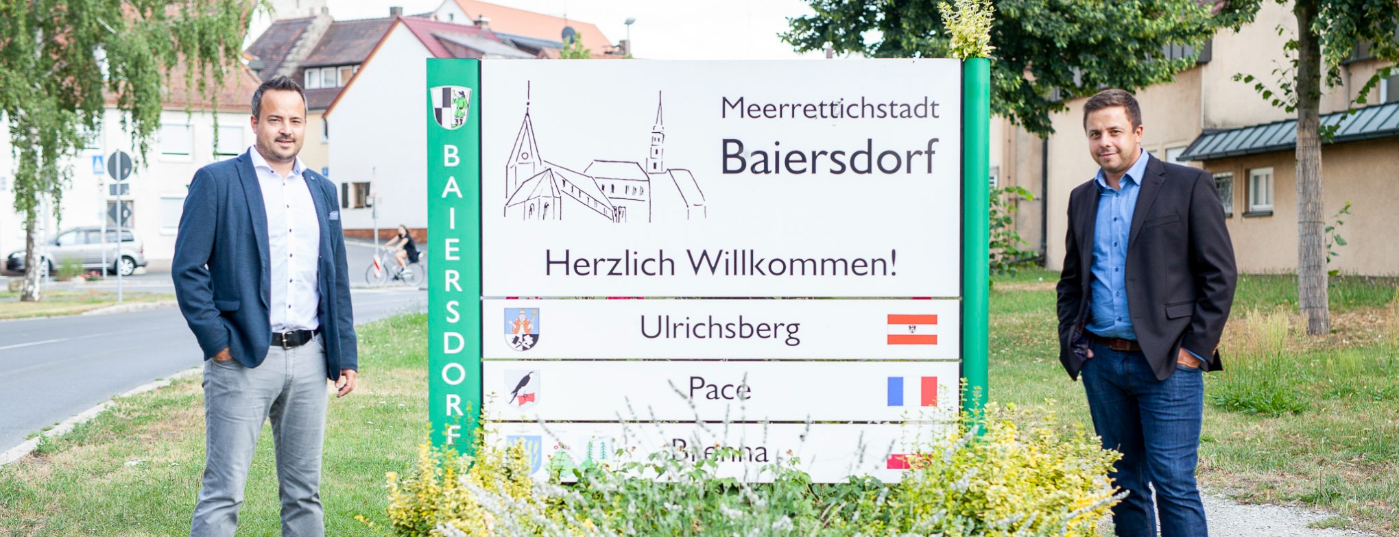 Allianz Versicherung Versicherungsbüro Uhlmann Inh. Florian und Stefan Uhlmann Baiersdorf - Agentur Uhlmann vor Ortschild