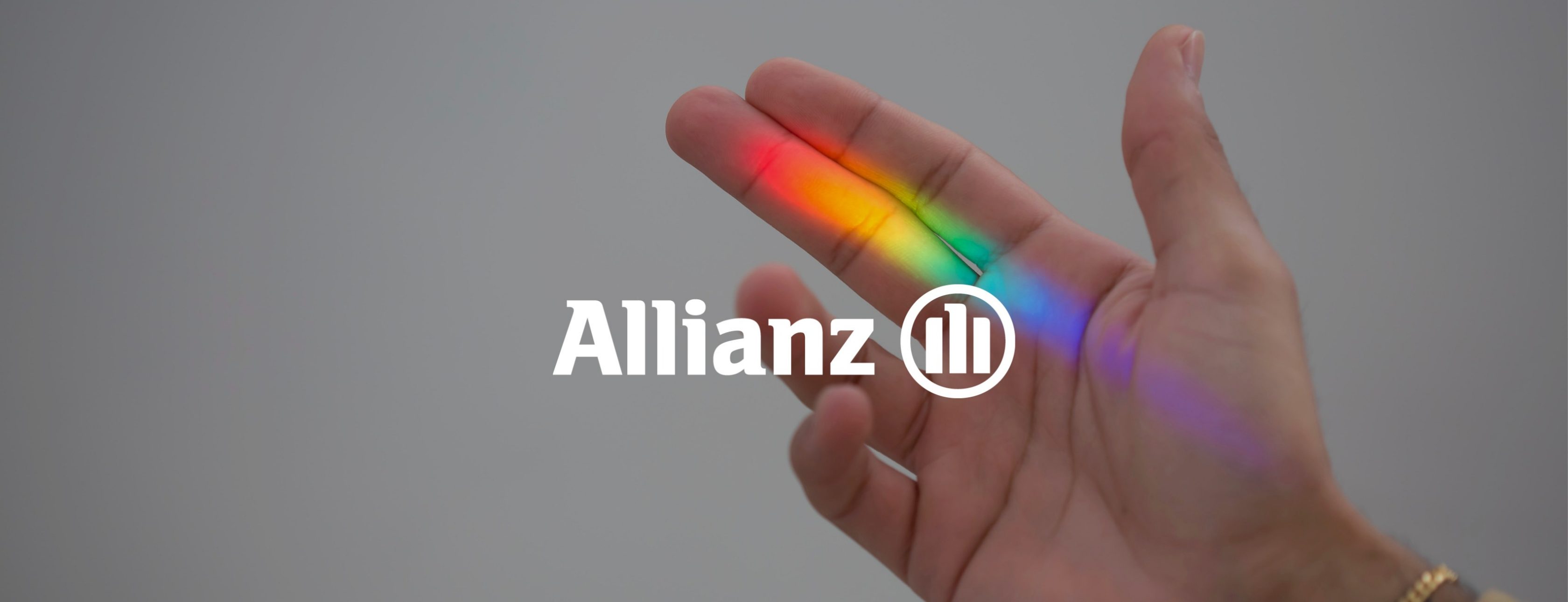 Allianz Versicherung Börje Voss Neustadt-Glewe - rechte Hand mit einem Regenbogen